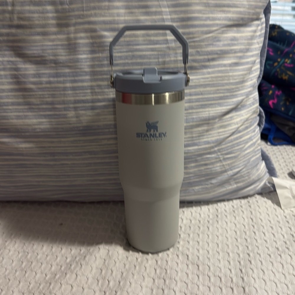 30 oz Stanley water bottle. Gray bottle with blue lid